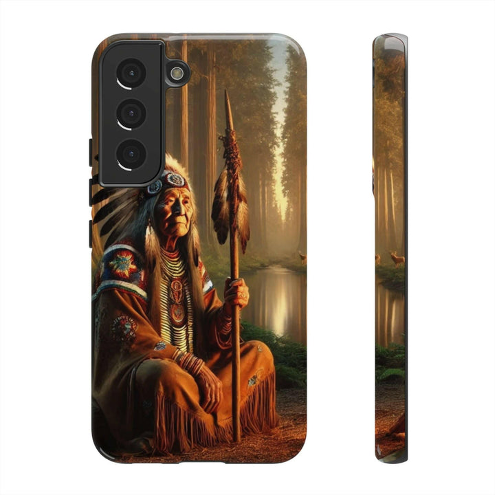 Phone case featuring a serene Native American elder holding a staff by a tranquil river. Detailed art for heritage appreciation.