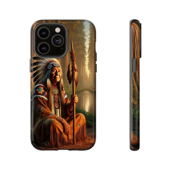 Phone case featuring a serene Native American elder holding a staff by a tranquil river. Detailed art for heritage appreciation.