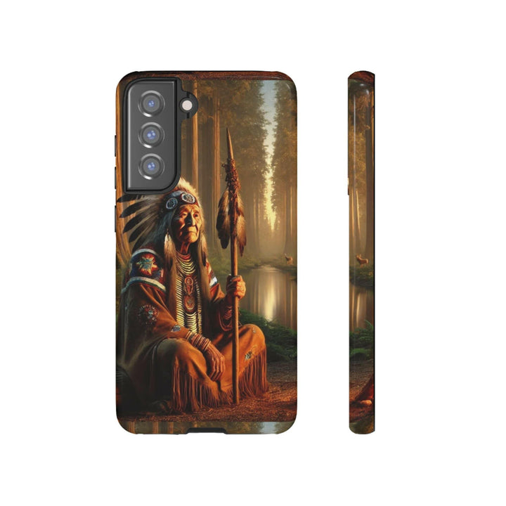 Phone case featuring a serene Native American elder holding a staff by a tranquil river. Detailed art for heritage appreciation.