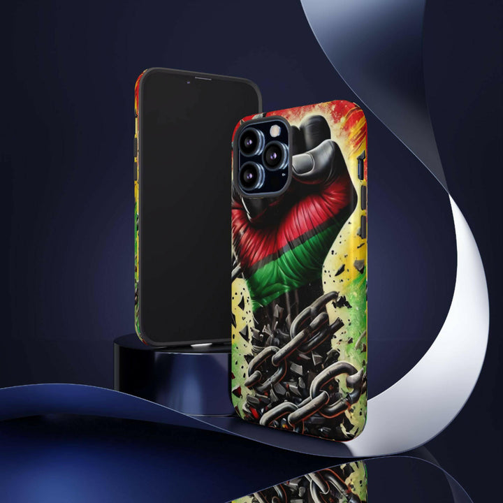 Black Pan-African fist phone case with chains breaking free, symbolizing strength and liberation. Durable and stylish for cultural expression.