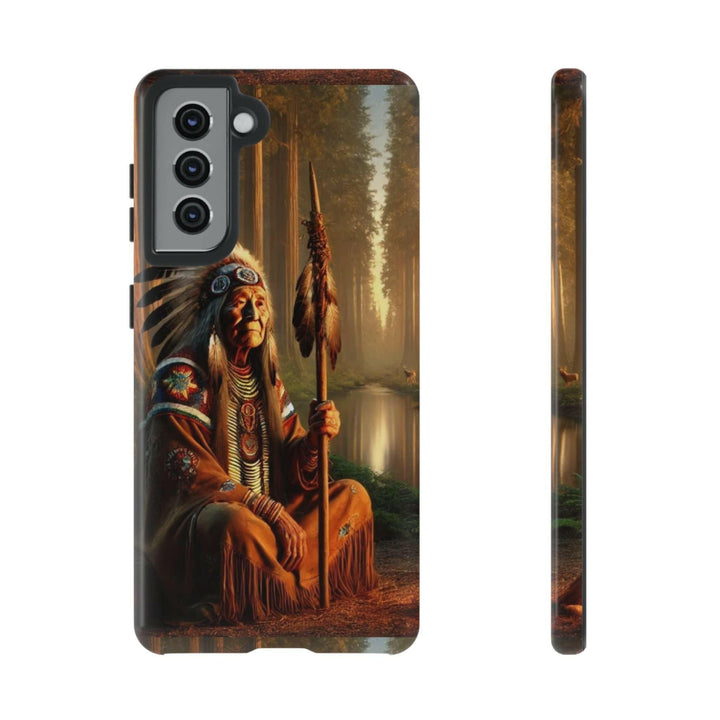 Phone case featuring a serene Native American elder holding a staff by a tranquil river. Detailed art for heritage appreciation.