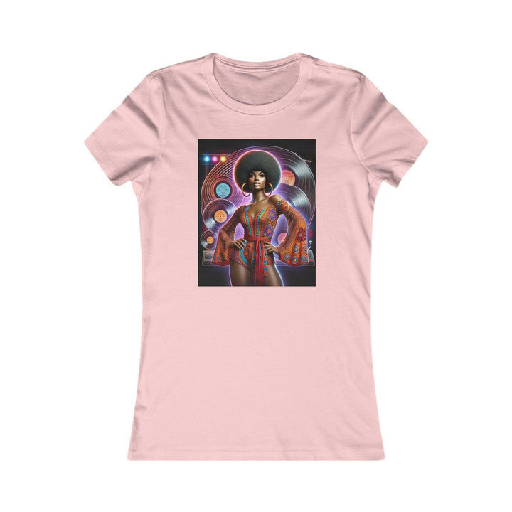 Pink T-shirt featuring a vibrant, retro-inspired illustration of a stylish woman in disco attire. Ideal for lovers of vintage style and Afrocentric fashion.