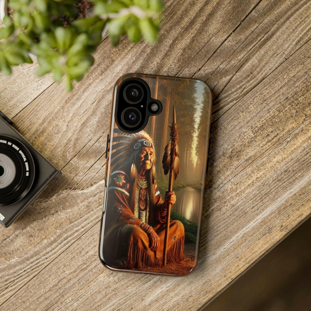 Phone case featuring a serene Native American elder holding a staff by a tranquil river. Detailed art for heritage appreciation.