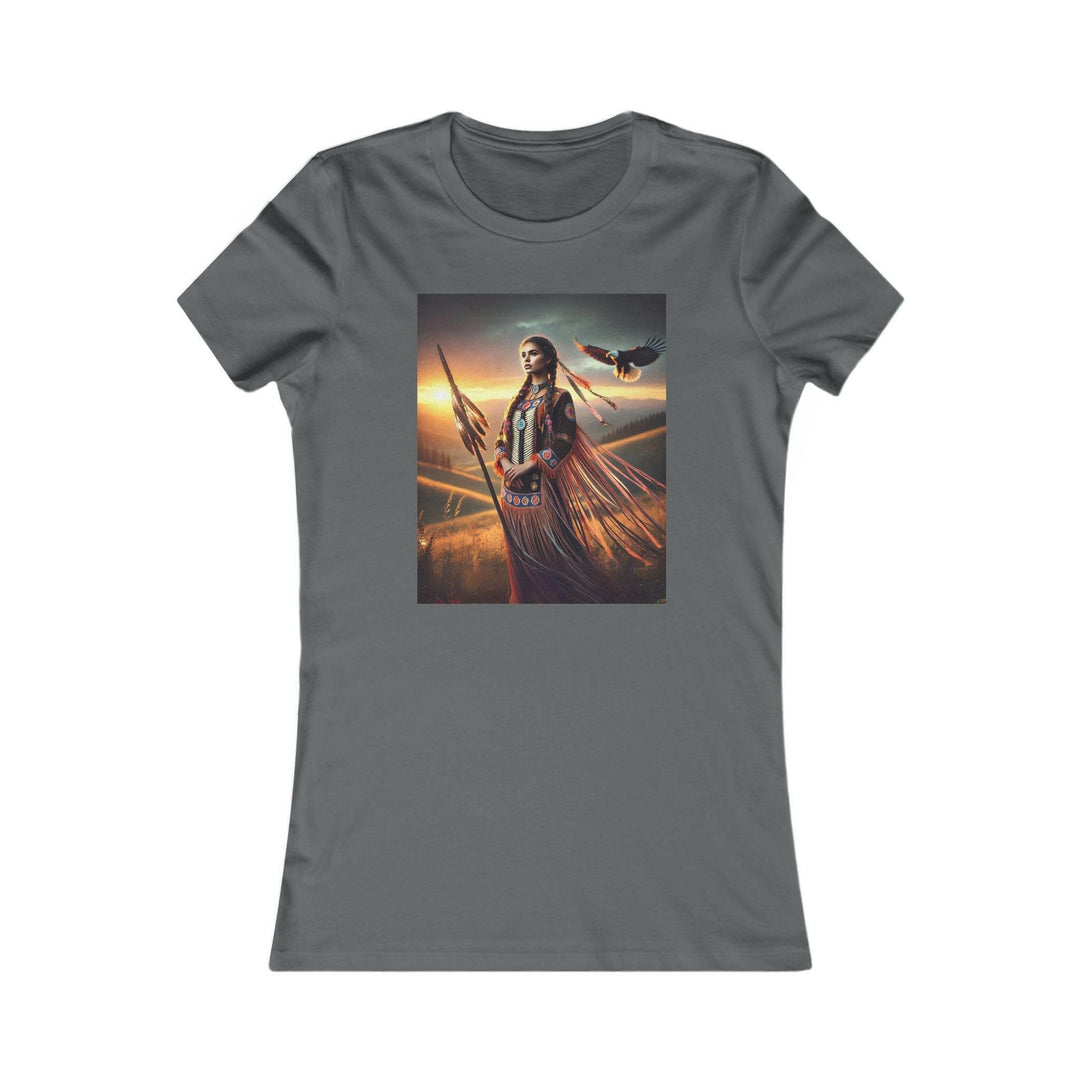 Asphalt Grey T-shirt featuring an illustration of a Native American warrior woman with a spear, set against a dramatic sunset. Represents strength, heritage, and cultural pride.