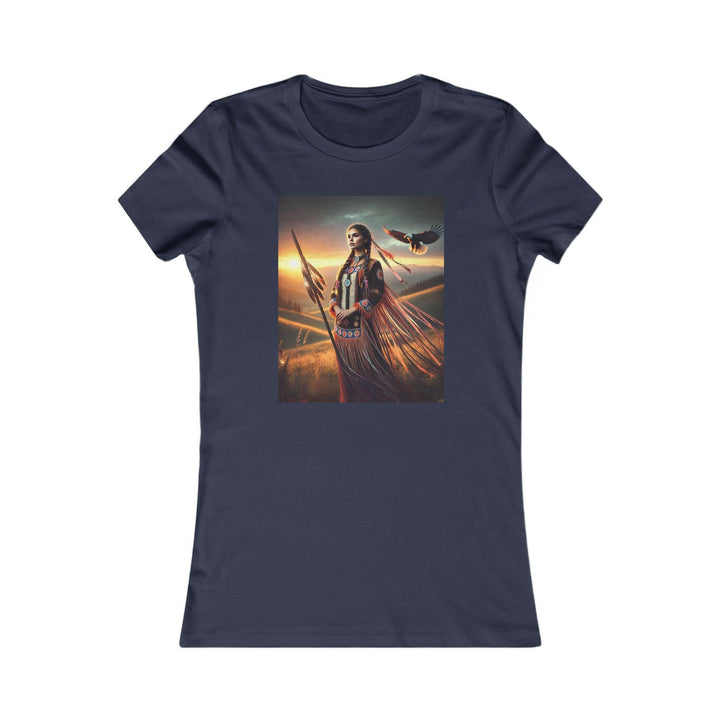 Navy Blue T-shirt featuring an illustration of a Native American warrior woman with a spear, set against a dramatic sunset. Represents strength, heritage, and cultural pride.